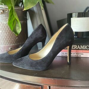Black suede pumps